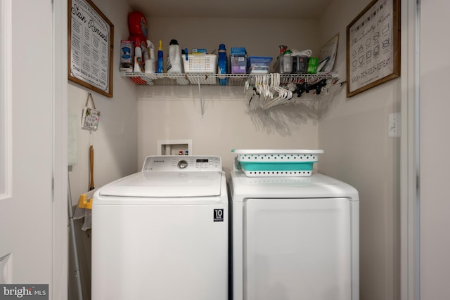 washroom featuring laundry area and independent washer and dryer