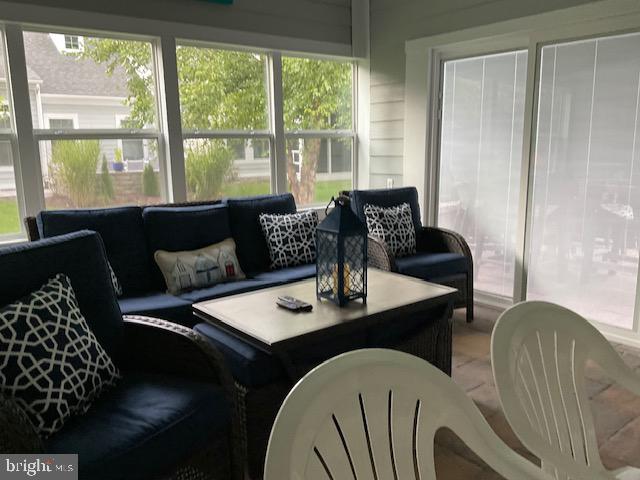 sunroom featuring a wealth of natural light