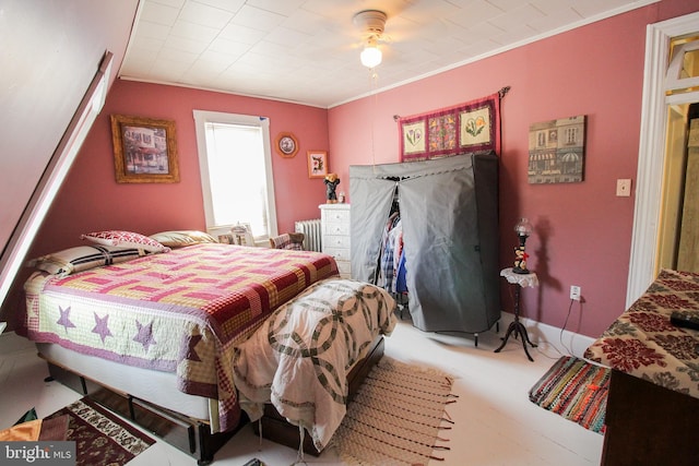 bedroom featuring radiator, crown molding, and ceiling fan