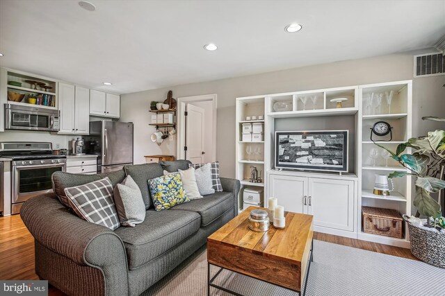 living room featuring light hardwood / wood-style flooring