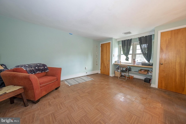 sitting room featuring baseboard heating