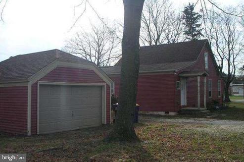 view of home's exterior with a garage