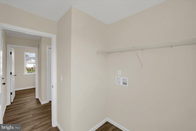 clothes washing area featuring hookup for a washing machine and dark hardwood / wood-style flooring