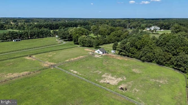 birds eye view of property featuring a rural view