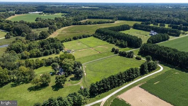 birds eye view of property featuring a rural view