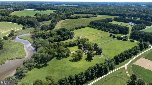 bird's eye view featuring a water view and a rural view