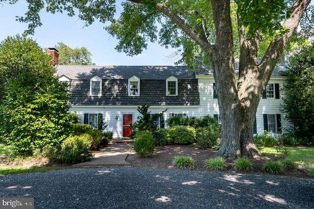 view of new england style home