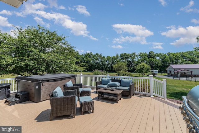 wooden terrace featuring a lawn, an outdoor living space, and a hot tub