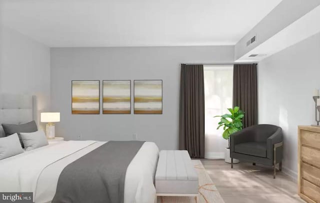 bedroom featuring light hardwood / wood-style flooring