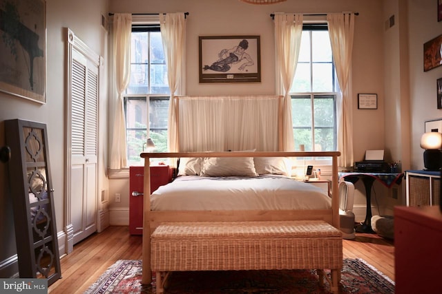 bedroom with light wood-type flooring