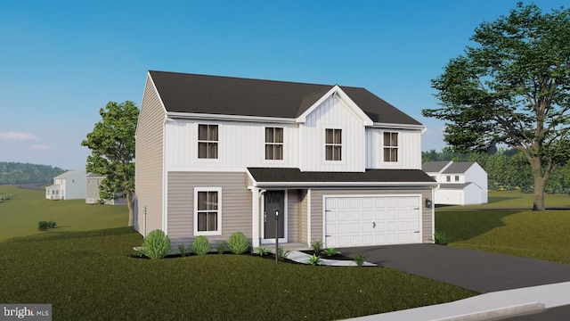 view of front facade with a garage and a front yard