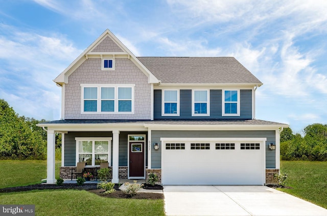 craftsman house with a garage, a porch, and a front lawn