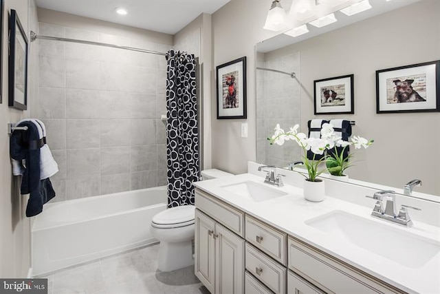 full bathroom featuring vanity, toilet, and shower / bath combo with shower curtain