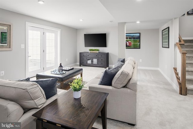 living room featuring light colored carpet