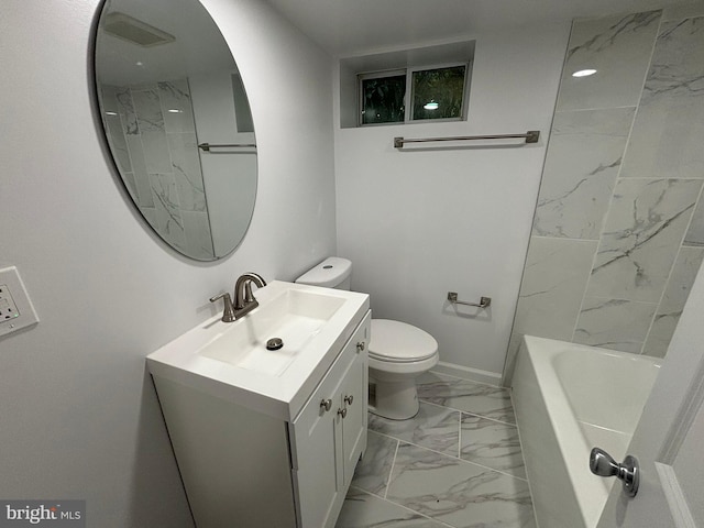 bathroom featuring vanity, toilet, baseboards, and marble finish floor