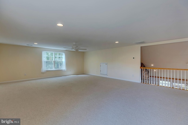 unfurnished room featuring carpet flooring and ceiling fan