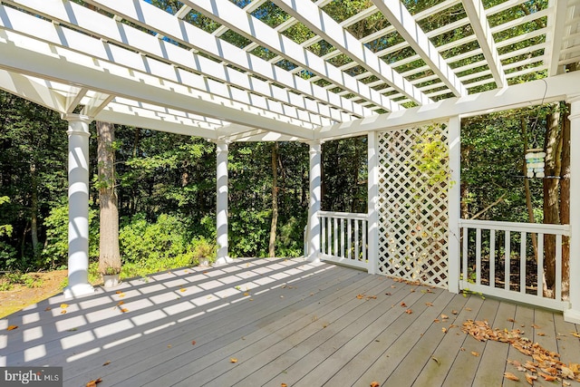 wooden deck featuring a pergola