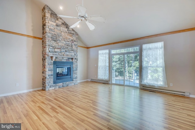 unfurnished living room featuring ceiling fan, a stone fireplace, light hardwood / wood-style floors, and baseboard heating