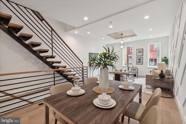 dining room with light hardwood / wood-style floors