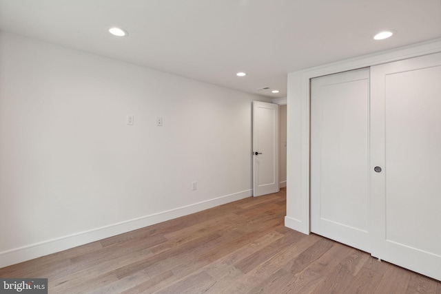 unfurnished bedroom with light hardwood / wood-style flooring