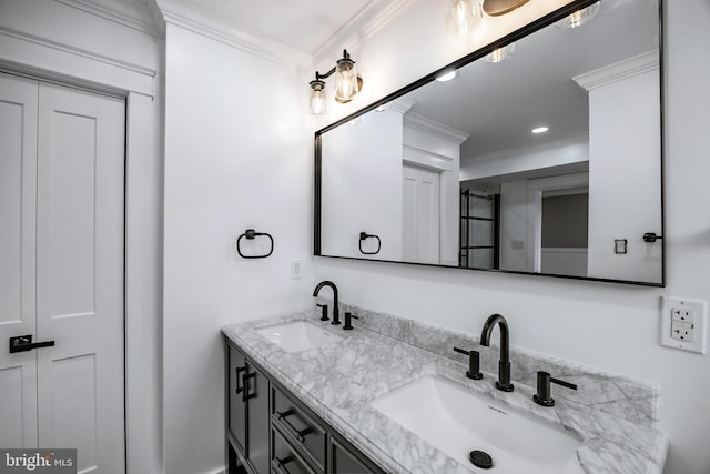 bathroom with vanity and crown molding