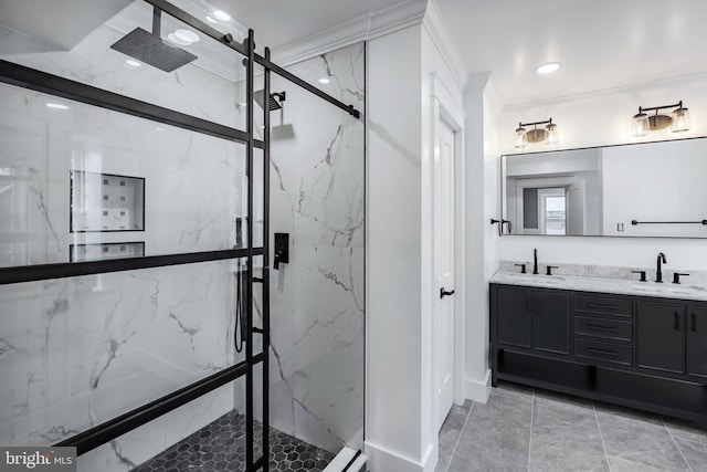 bathroom featuring crown molding, vanity, and a shower with shower door