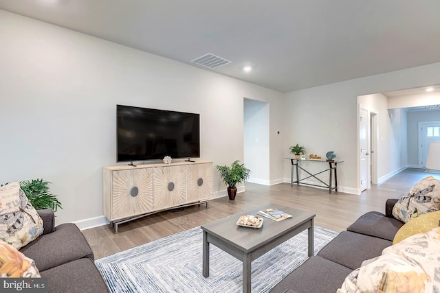 living room with hardwood / wood-style floors