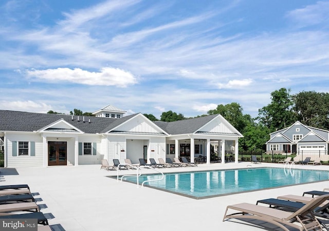 view of swimming pool with a patio