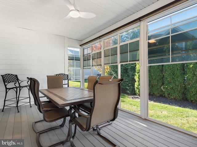 sunroom / solarium with ceiling fan