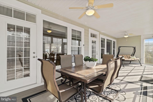 sunroom with french doors and ceiling fan