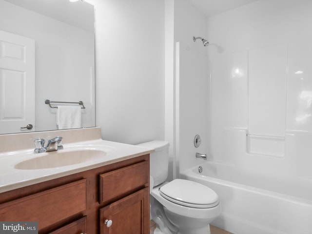 full bath featuring vanity, toilet, and shower / bath combination