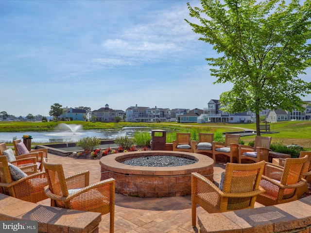 view of patio / terrace with a water view