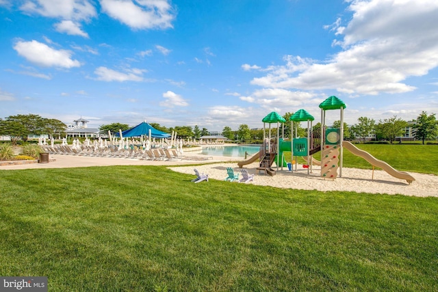 view of playground with a yard