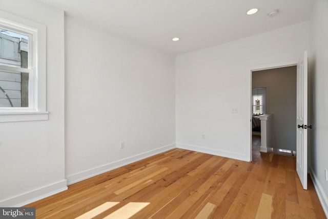 unfurnished bedroom with light wood-type flooring