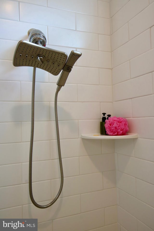 room details with a tile shower