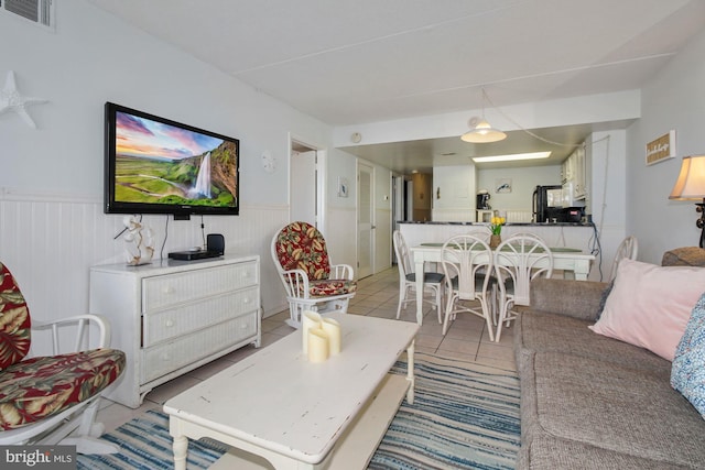 living room featuring light tile patterned floors