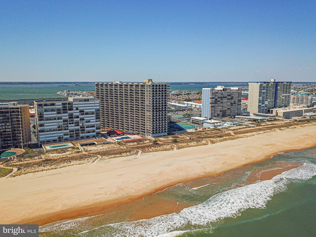 aerial view with a beach view and a water view