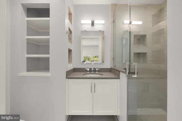 walk in closet featuring light hardwood / wood-style flooring