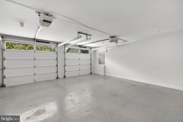 garage featuring electric panel and a garage door opener