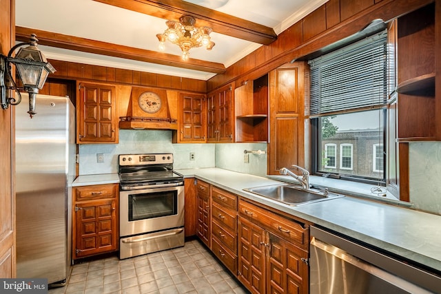 kitchen with beamed ceiling, sink, appliances with stainless steel finishes, custom range hood, and an inviting chandelier