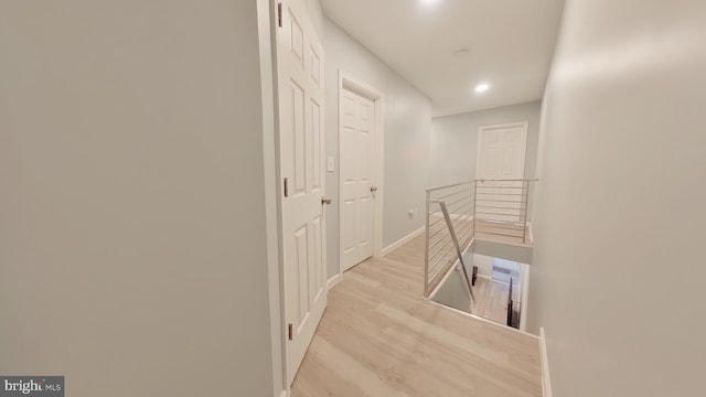 corridor featuring light wood-type flooring