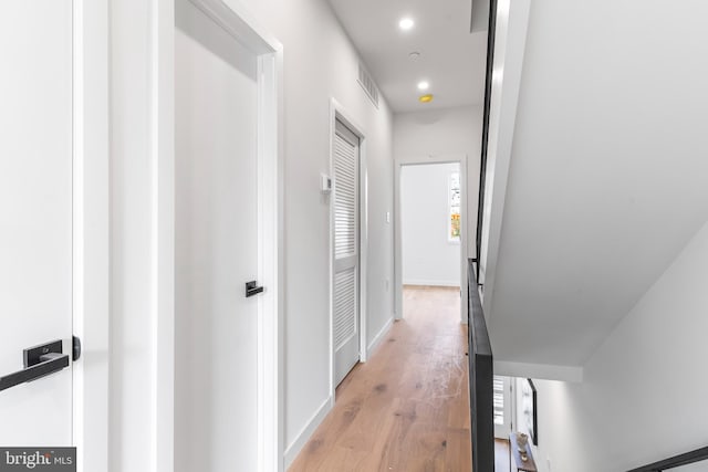 hall featuring light hardwood / wood-style floors