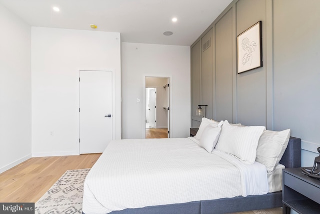 bedroom featuring light hardwood / wood-style flooring