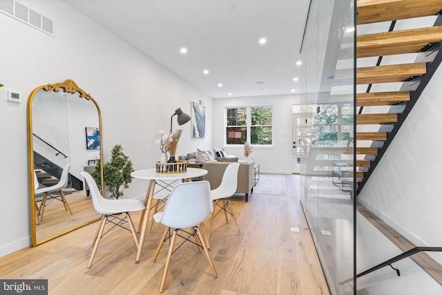 dining space featuring light hardwood / wood-style flooring