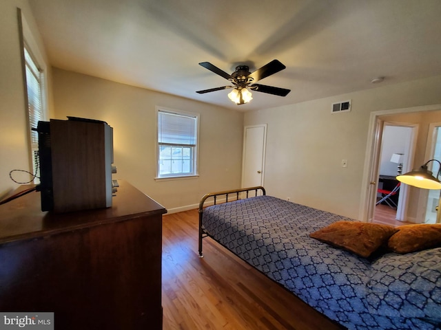 bedroom featuring ceiling fan and light wood-type flooring