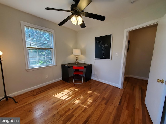 interior space featuring hardwood / wood-style flooring and ceiling fan