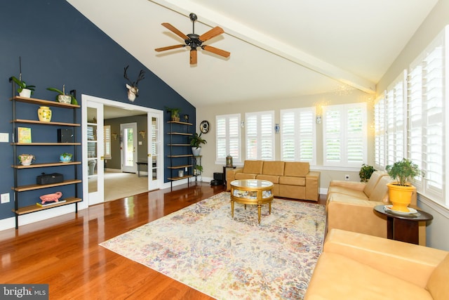 living room featuring french doors, wood-type flooring, high vaulted ceiling, ceiling fan, and beam ceiling