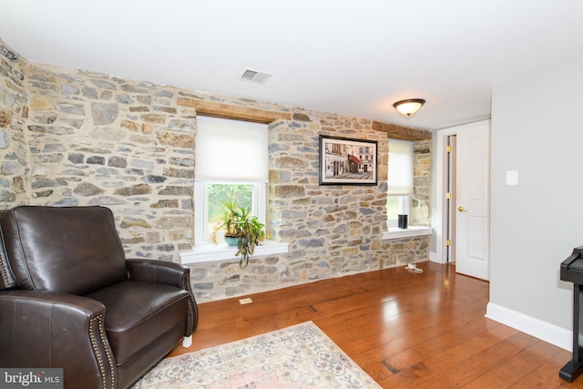 sitting room featuring hardwood / wood-style flooring