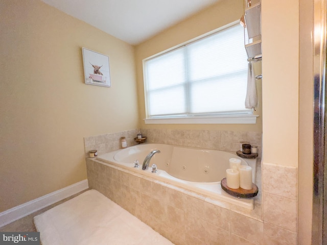 bathroom featuring tiled bath