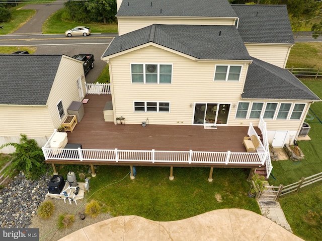 rear view of property with a deck